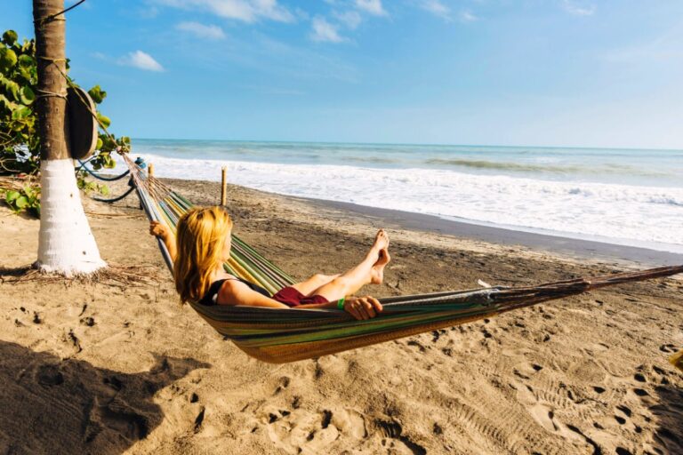 Woman relaxing on a beach in Colombia